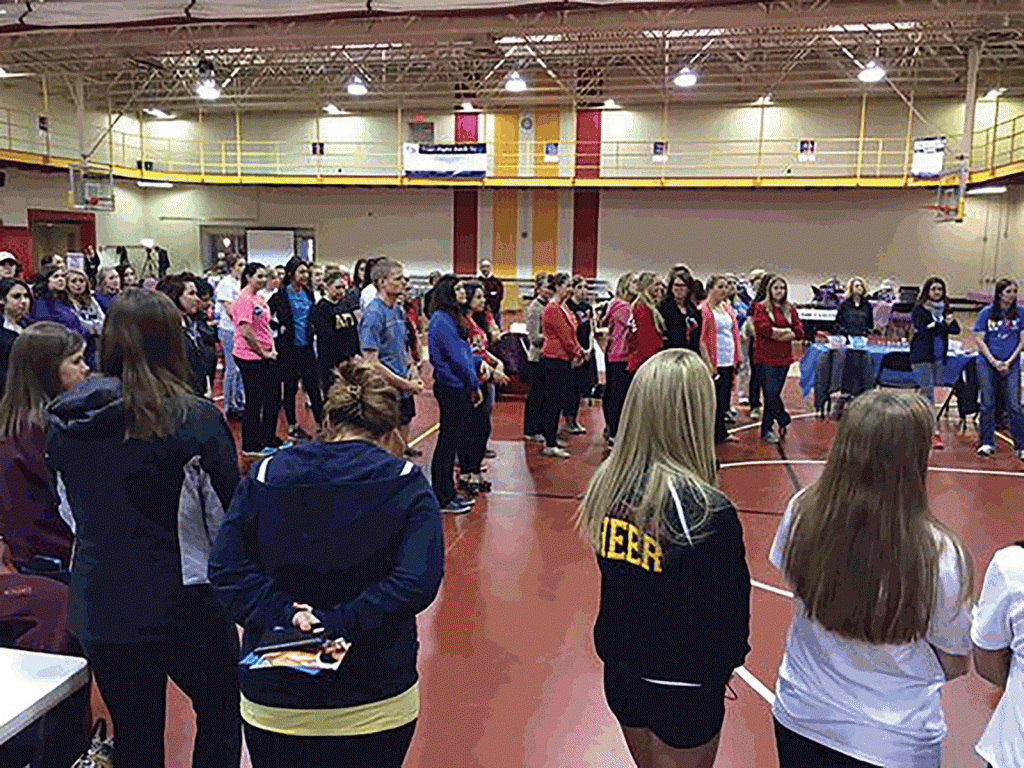 The+Relay+for+Life+crowd+waits+to+begin+walking+at+the+Gannon+University+Recreation+and+Wellness+Center+Friday.