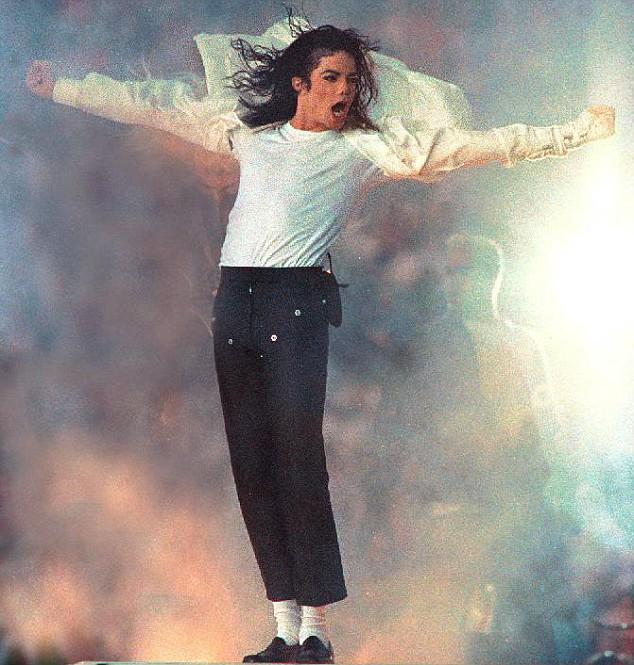 January 1993, Pasadina, California, USA: Michael Jackson performs at the Rose Bowl. On Monday, November 24, 2003, Michael Jackson publicly launched a new website dedicated to countering the molestation charges currently being levelled against him. The website, www.MJnews.us, is intended to be Jacksons official source of communication, with Jackson writing that any statements purported to be about or from him that are not on the Web site are not credible. Last Thursday, Santa Barabara police booked Jackson on suspicion of child molestation; he was released on $3 million bond. The victim is reported to be a thirteen-year-old boy; it is widely reported that the boy is a cancer victim who appeared in the Martin Bashir documentary of Jackson that made waves when it aired early this year. Jackson has insisted that he is innocent of the current charges. However, he is no stranger to child molestation accusations; a 1993 scandal never amounted to charges because Jackson settled with his accuser in a multi-million dollar settlement out of court. Jackson is scheduled to be arraigned on January 9 in Santa Barabara Superior Court. Right now, the star is keeping a low level, while friends, family and fans have been rallying around the world to ponder the credibilty of the charges, hold vigils and wonder about the elusive star and his possibly sordid past.. Credit: Dan Cappellazzo / Polaris / eyevine

For further information please contact eyevine.
tel: 020 8709 8709
email: info@eyevine.com
www.eyevine.com
HI-RES AVAILABLE ON REQUEST