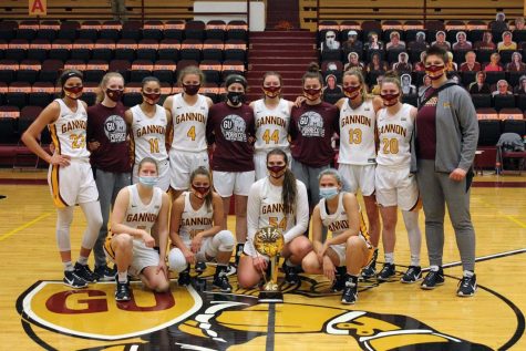 Gannon University’s women’s basketball team celebrates a 73-60 victory over rival Mercyhurst University in the Porreco Pride of Erie game Saturday at the Hammermill Center.
