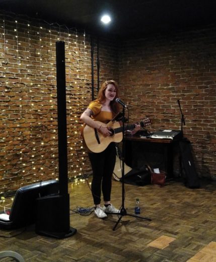 Gannon student participates in past karaoke night at The Knight Club.
