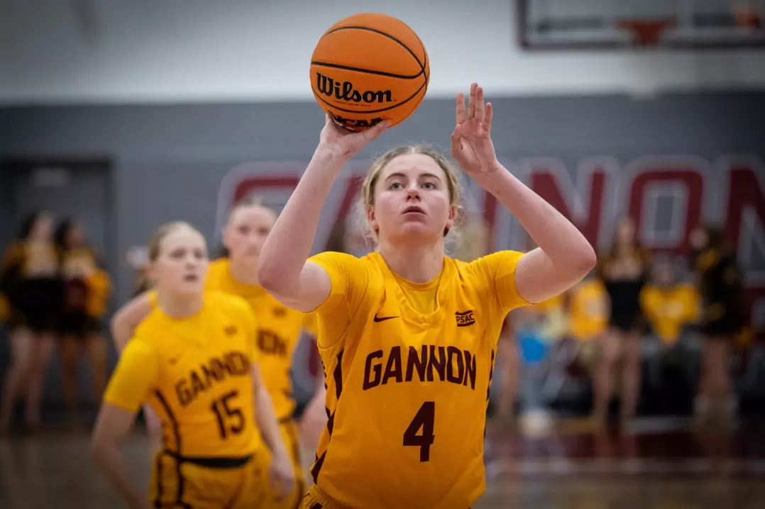 #4 Maddy Wheatley prepares to shoot the ball.