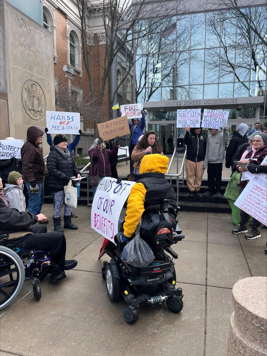 Local patrons from the Erie area came together in front of the federal courthouse for a rally in opposition of a proposed bill affecting Medicaid coverage.