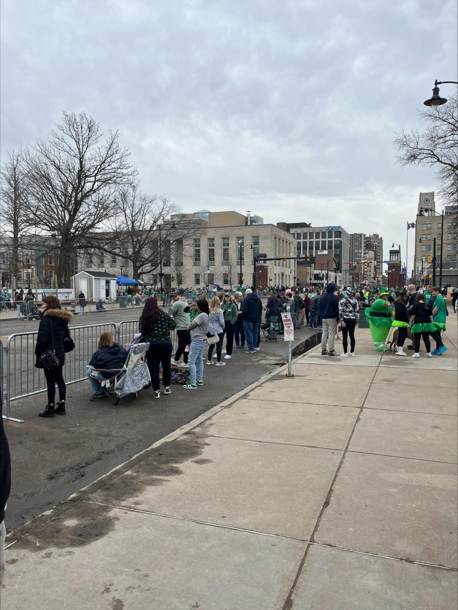 Erie residents come together to witness the city's annual St. Patrick's Parade. 