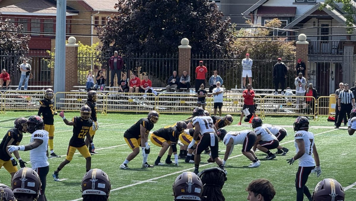Gannon’s offense, led by quarterback Anthony Harris (#8), prepares to execute play on first drive.