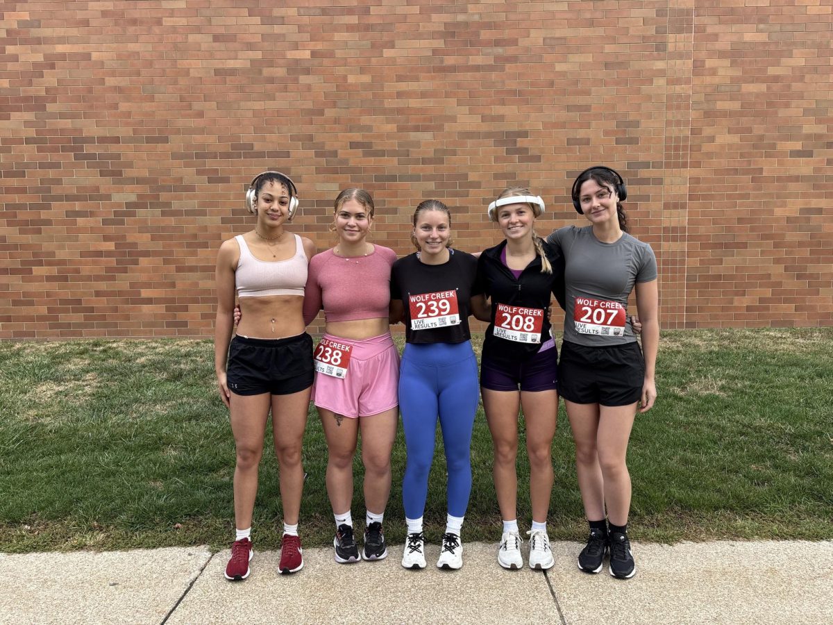 Pictured: (From left to right) Kallah Zacherl, Christina Chavez, Zoe Gaetjens, Ava Weibley, and Kate Wood pose for a picture outside of Gannon’s Recreation and Wellness Center before the Knightmare Dash 5K on Saturday, September 27.
